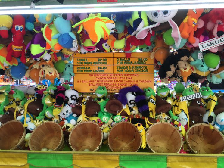 Try your hand at a skill-based game on the midway. (Tori Floyd)