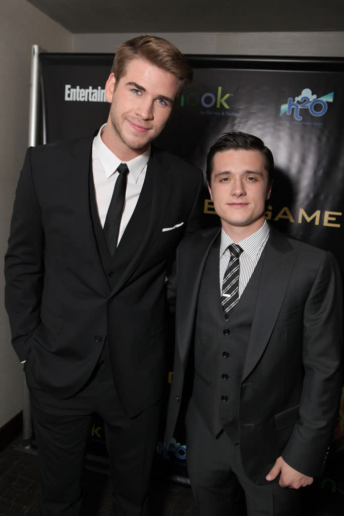 Liam Hemsworth and Josh Hutcherson arrive at the world premiere of "The Hunger Games" in Los Angeles, California.