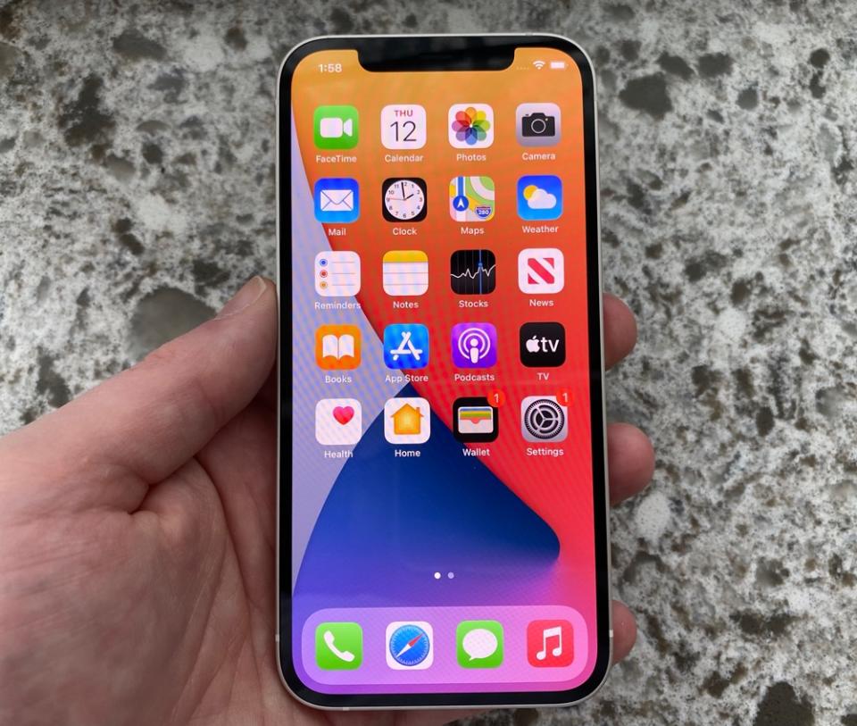 The iPhone 12 packs all of the features of the iPhone 12 mini, but adds a larger display for a better viewing experience. (Daniel Image: Howley)