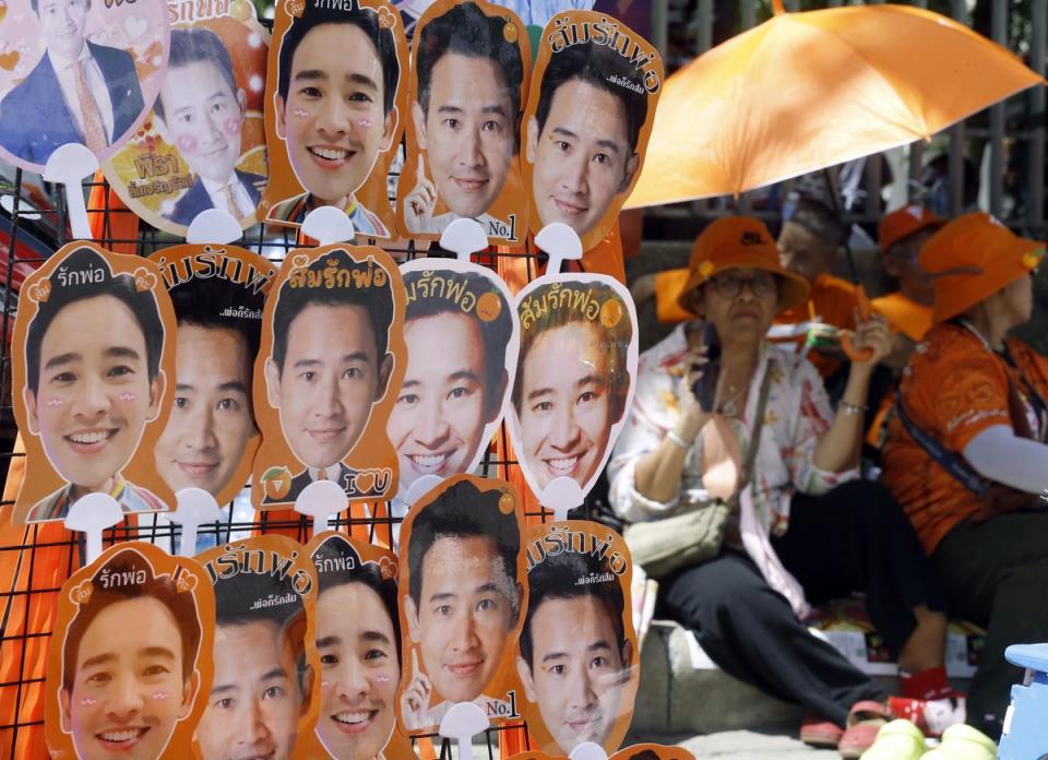 Supporters of Move Forward Party’s leader Pita Limjaroenrat gather outside parliament (EPA)