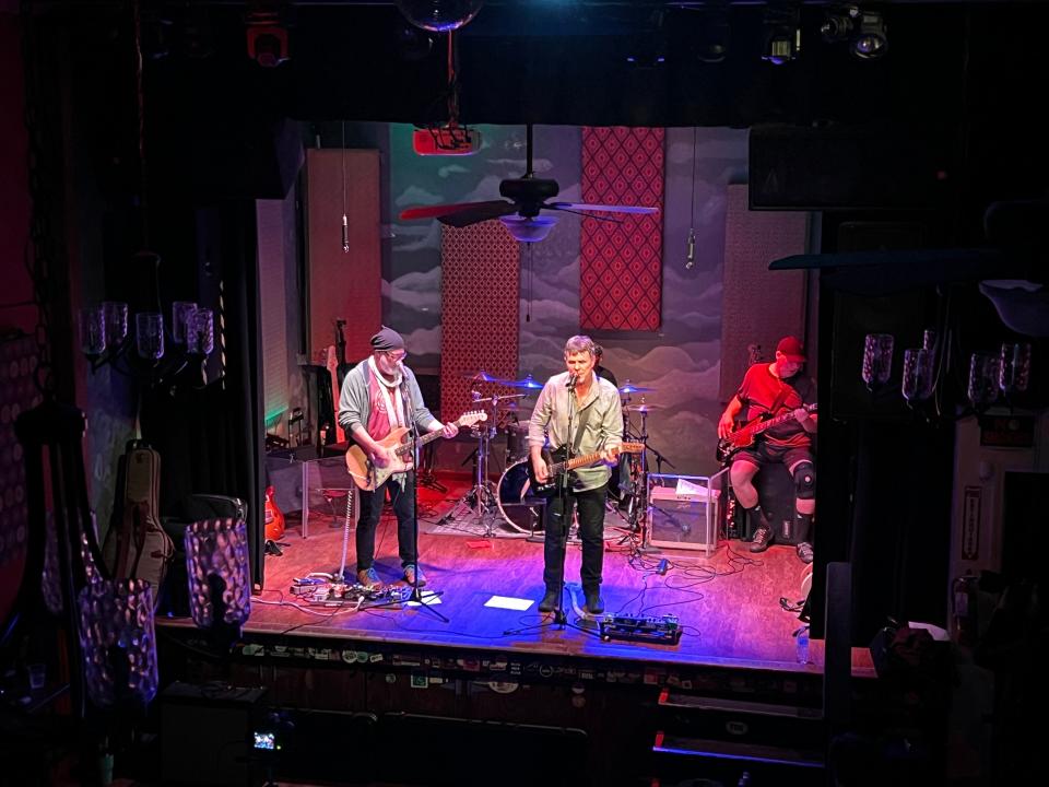 Brian Lisik of Perry Township performs with his band Hard Legs recently at the Rialto Theatre in Akron at a concert marking the release of Lisik's album, "Nu Wreckard."