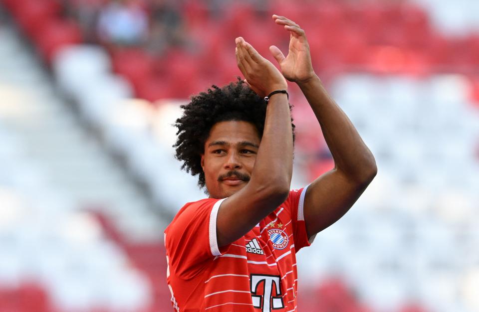 Bayern Munich's German midfielder Serge Gnabry applauds  during the team presentation of the German first division Bundesliga team FC Bayern Munich at the Allianz Arena in Munich, southern Germany, on July 16, 2022. - Bayern Munich announced on July 16, 2022 that they have extended the contract of their German international winger Serge Gnabry until 2026. (Photo by Christof STACHE / AFP) (Photo by CHRISTOF STACHE/AFP via Getty Images)