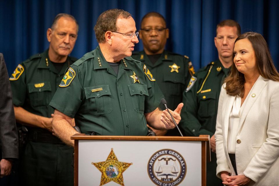 Polk County Sheriff Grady Judd and Florida Attorney General Ashley Moody speak during a news conference announcing a new statewide taskforce to combat organized retail theft rings at the Polk County Sheriff's Operation Center in Winter Haven on Thursday.