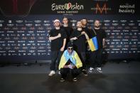 Kalush Orchestra of Ukraine pose for photographers after winning the Grand Final of the Eurovision Song Contest at Palaolimpico arena, in Turin, Italy, Sunday, May 15, 2022. (AP Photo/Luca Bruno)