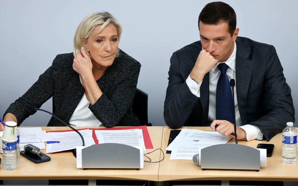 National Rally leader Marine Le Pen with party president Jordan Bardella