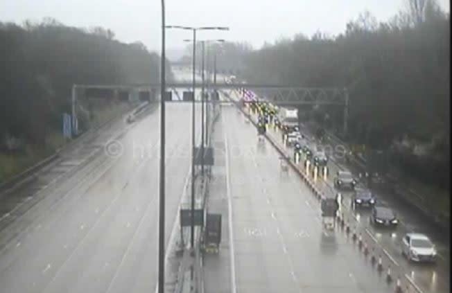 Traffic looks to leave the M25 on a wet Saturday morning (Traffic Cameras)