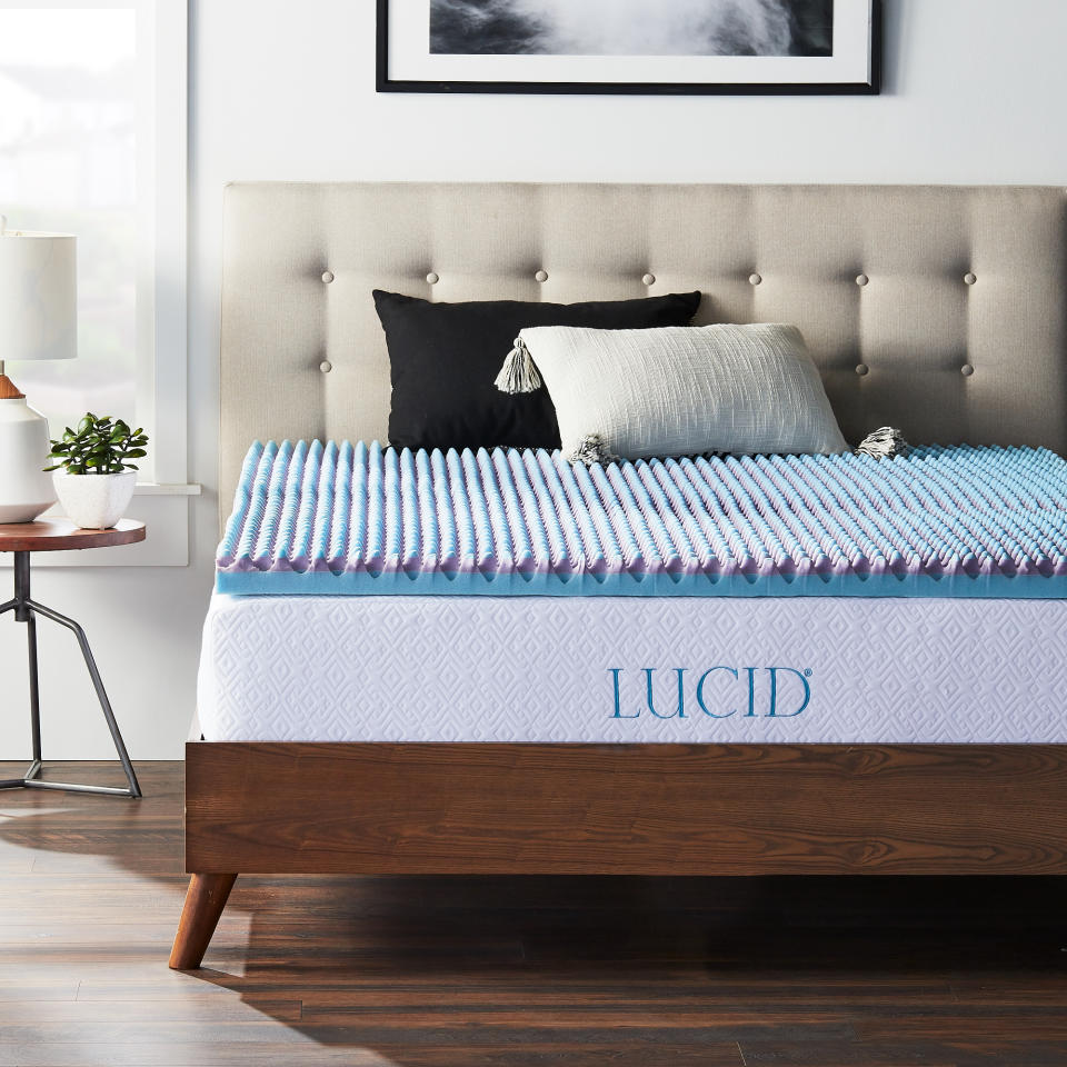 Just 2.5 inches of cooling memory foam is all it takes to make your bed feel new again. (Photo: Walmart)