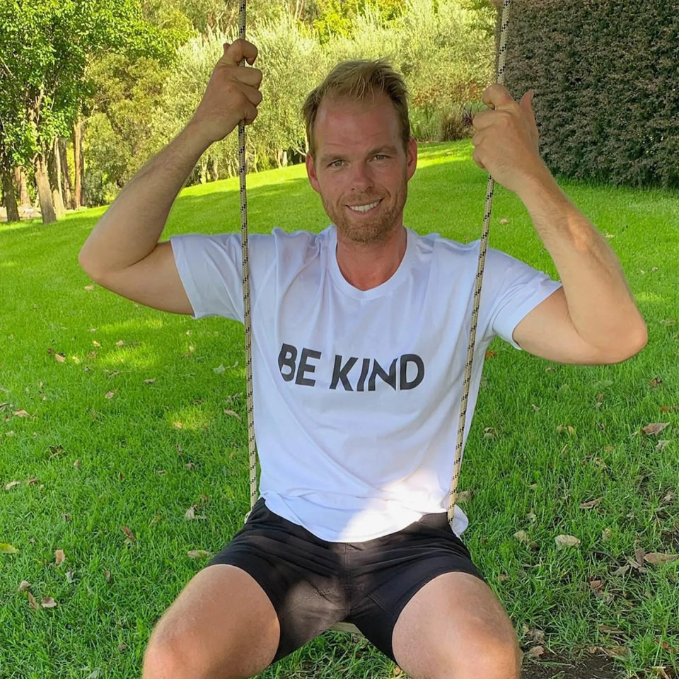 The Bachelorette's Jarrod Woodgate wearing a 'Be Kind' t-shirt.