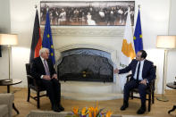 Cyprus' President Nikos Christodoulides, right, and German President Frank-Walter Steinmeier talk during their meeting at the Presidential palace in capital Nicosia, Cyprus, Monday, Feb. 12, 2024. Steinmeier is in island of Cyprus for official visit. Steinmeier is the first president of Germany to visit Cyprus since the two countries established diplomatic relations when the east Mediterranean island gained independence from British colonial rule in 1960. (AP Photo/Petros Karadjias, Pool)