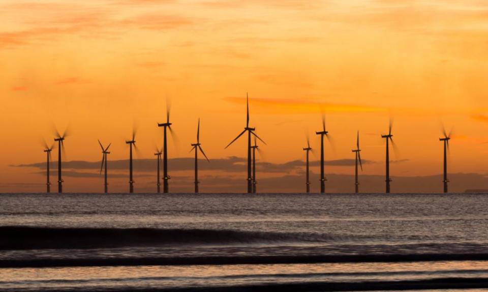 Sunrise from Seaton Carew beach near Hartlepool with Teesside offshore wind farm in distance.