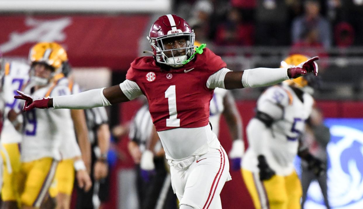 Alabama defensive back Kool-Aid McKinstry celebrates after a missed field goal by LSU.