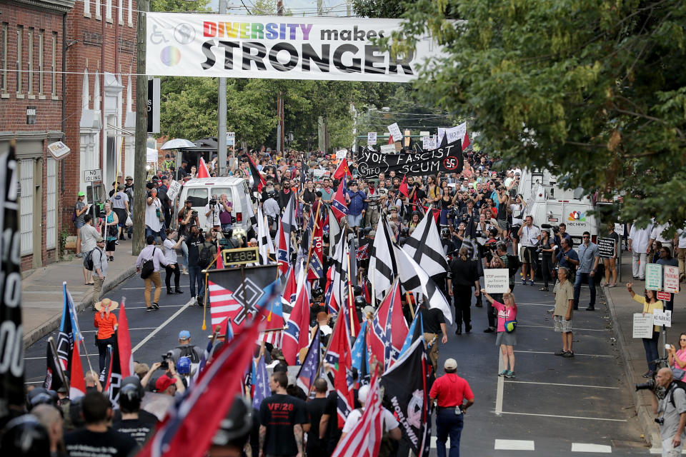 Hundreds of white nationalists&nbsp;and neo-Nazis march down East Market Street toward Lee Park during the "Unite the Right" rally.