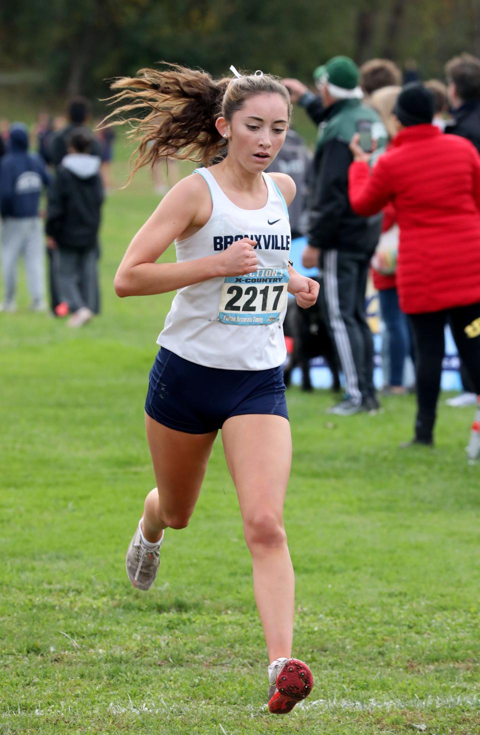 Maddie Williams from Bronxville approaches the finish line as athletes compete in the girls Class C Section 1 Cross Country Championships at Bowdoin Park in Wappingers Falls, Nov. 4, 2023.