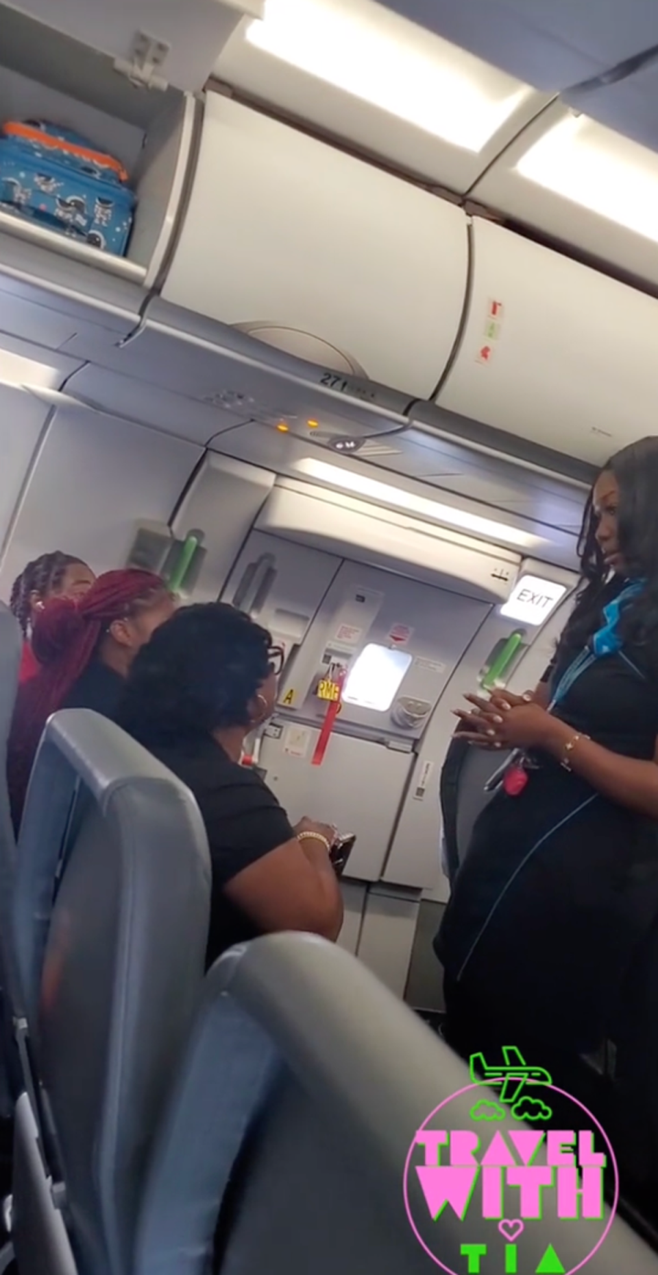 Woman refuses to comply with exit row instructions causing plane to deboard (TikTok / @travelwithtia23)