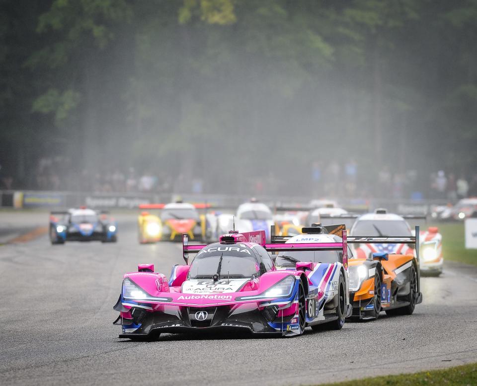 The No. 60 Meyer Shank Racing Acura of Oliver Jarvis and Tom Blomqvist leads a group of cars in the rain last year at Road America. This year Blomqvist co-drives with Colin Braun in the No. 60 GTP car, which has won two races.