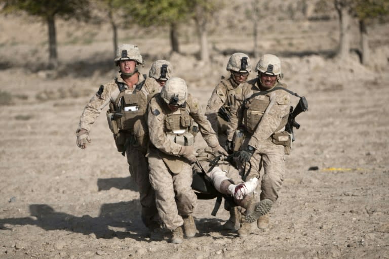 The Marines, pictured in 2011, were among the first US forces sent to Afghanistan with several thousand deployed in Helmand, where they engaged in bitter combat with Taliban