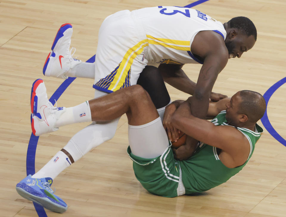 Boston Celtics center Al Horford battles with Golden State Warriors forward Draymond Green ending in a jump ball during Game 2 of the 2022 NBA Finals at the Chase Center in San Francisco on June 5, 2022. (Matthew J. Lee/The Boston Globe via Getty Images)