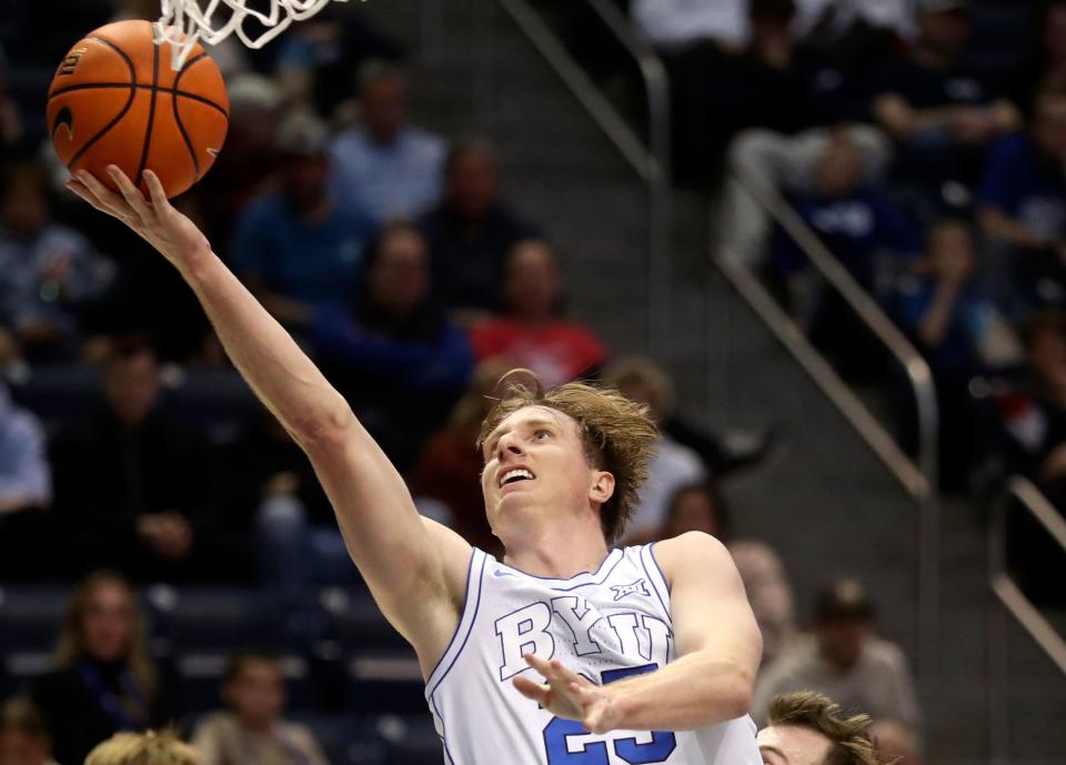Brigham Young Cougars guard Dawson Baker (25) shoots during a men’s basketball game against the Bellarmine Knights at the Marriott Center in Provo on Friday, Dec. 22, 2023. BYU won 101-59. | Kristin Murphy, Deseret News