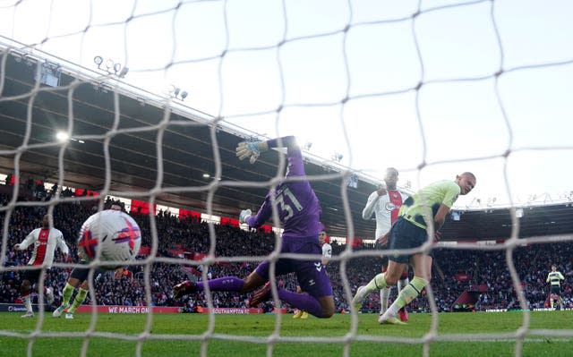 Erling Haaland scores the first of his two goals in Manchester City's 4-1 thrashing of Southampton