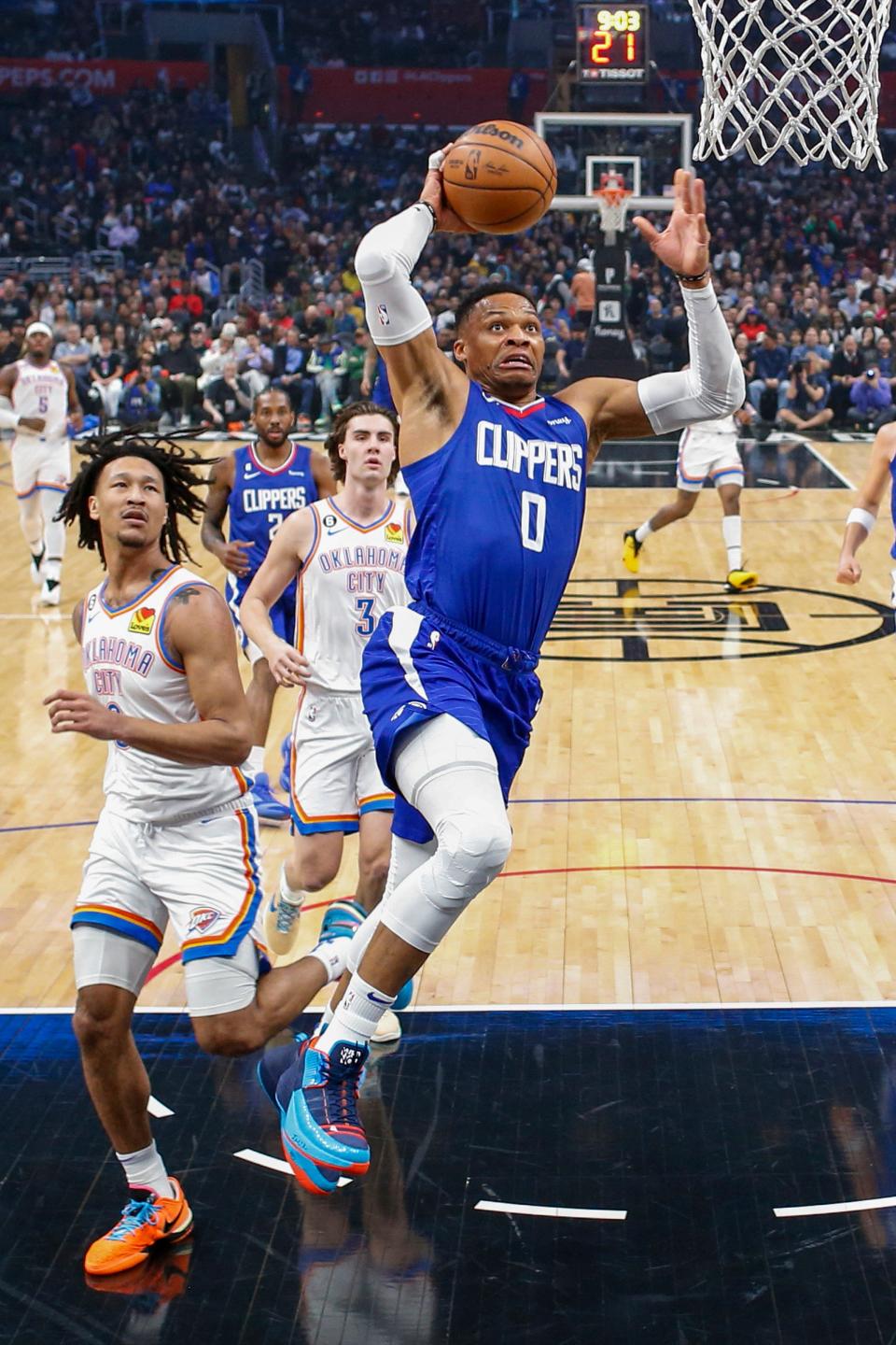 Los Angeles Clippers guard Russell Westbrook (0) goes to the basket against the Oklahoma City Thunder during the first half of an NBA basketball game Tuesday, March 21, 2023, in Los Angeles. (AP Photo/Ringo H.W. Chiu)