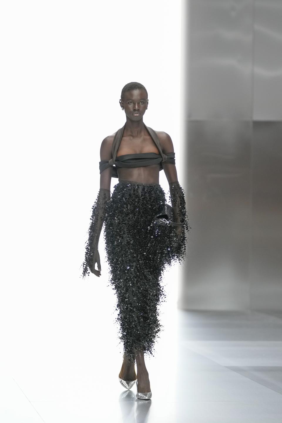 A model wears a creation for Fendi as part of the Haute Couture Spring-Summer 2024 collection presented in Paris, Thursday, Jan. 25, 2024. (AP Photo/Thibault Camus)
