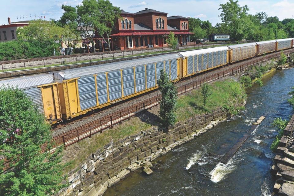 A train with new auto racks, special rail cars used to transport new vehicles. TTX is the "pooling company" that owns and manages the rail cars that are shared by all the railroads.