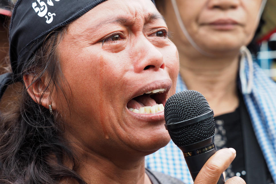 Oum Sophy, a victim of land grabs, shouts during a protest on World Habitat Day in Phnom Penh on Oct. 10, 2016.