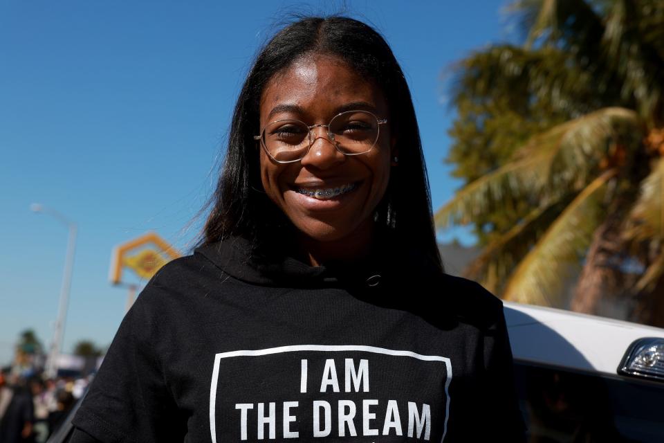 MIAMI, FLORIDA - JANUARY 16: Santiana Lewis enjoys the Dr. Martin Luther King Jr. Day Parade in the Liberty City neighborhood on January 16, 2023 in Miami, Florida. The annual event honors the late civil rights leader. (Photo by Joe Raedle/Getty Images)