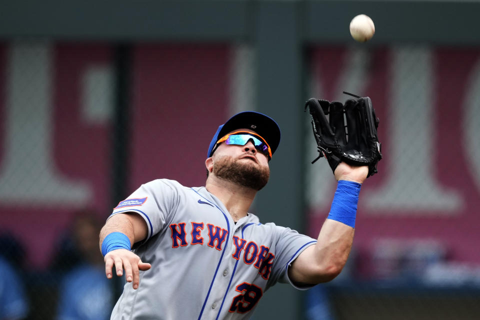 New York Mets right fielder DJ Stewart catches a fly ball for the out on Kansas City Royals' Salvador Perez during the third inning of a baseball game Thursday, Aug. 3, 2023, in Kansas City, Mo. (AP Photo/Charlie Riedel)