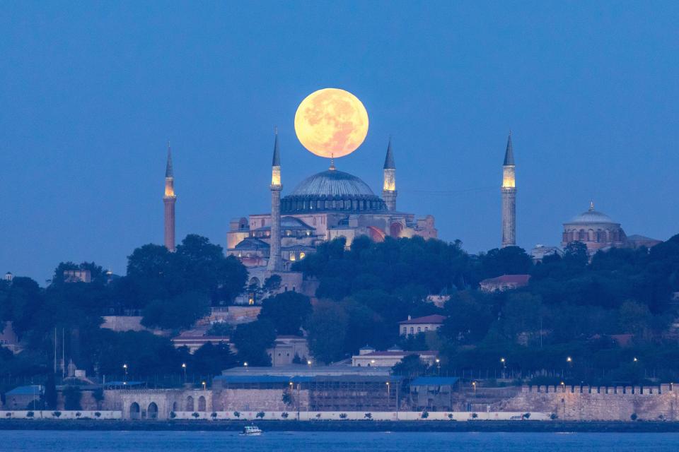 August 31, 2023: ISTANBUL, TURKEY - AUGUST 31: A rare Super Blue Moon rises over Istanbul's famous Hagia Sophia Mosque and Bosphorus with foreground plan on August 31, 2023 in Istanbul, Turkey. The rare super moon is an occurrence which won't happen again until 2037, the term ''Blue Moon'' does not refer to the color of the moon, but is the term used to signify the second full moon in a month. (Credit Image: © Tolga Ildun/ZUMA Press Wire) EDITORIAL USAGE ONLY! Not for Commercial USAGE!