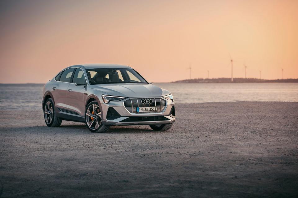 <p><a href="https://www.caranddriver.com/audi" rel="nofollow noopener" target="_blank" data-ylk="slk:Audi's;elm:context_link;itc:0;sec:content-canvas" class="link ">Audi's</a> answer to the burgeoning breed of all-electric crossovers isn't as stylish as the <a href="https://www.caranddriver.com/jaguar/i-pace-2020" rel="nofollow noopener" target="_blank" data-ylk="slk:Jaguar I-Pace;elm:context_link;itc:0;sec:content-canvas" class="link ">Jaguar I-Pace</a> or as innovative as the <a href="https://www.caranddriver.com/tesla/model-x-2020" rel="nofollow noopener" target="_blank" data-ylk="slk:Tesla Model X;elm:context_link;itc:0;sec:content-canvas" class="link ">Tesla Model X</a>. Instead, the <a href="https://www.caranddriver.com/audi/e-tron-2020" rel="nofollow noopener" target="_blank" data-ylk="slk:2020 e-tron;elm:context_link;itc:0;sec:content-canvas" class="link ">2020 e-tron</a> is intended to magnify the advantages of EVs in a more traditional package that exemplifies the company's luxury pedigree. With standard all-wheel drive and a 4000-pound towing capacity, the two-row crossover has the capability many <a href="https://www.caranddriver.com/features/g27257734/best-suvs/" rel="nofollow noopener" target="_blank" data-ylk="slk:SUV;elm:context_link;itc:0;sec:content-canvas" class="link ">SUV</a> shoppers expect. While its 200-plus-mile range isn't groundbreaking, Audi thinks that's more than enough for most daily commutes. A sumptuous interior fitted with state-of-the-art technology further proves that the 2020 e-tron is more interested in making the EV segment more desirable rather than advancing it. </p><p><a class="link " href="https://www.caranddriver.com/audi/e-tron-2020" rel="nofollow noopener" target="_blank" data-ylk="slk:Review, Pricing, and Specs;elm:context_link;itc:0;sec:content-canvas">Review, Pricing, and Specs</a></p>