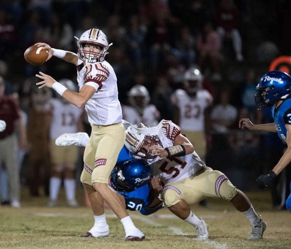 Quarterback Kaden Odom (4) gets set to pass during the Northview vs Jay football game at Jay High School in Jay on Friday, Oct. 14, 2022.