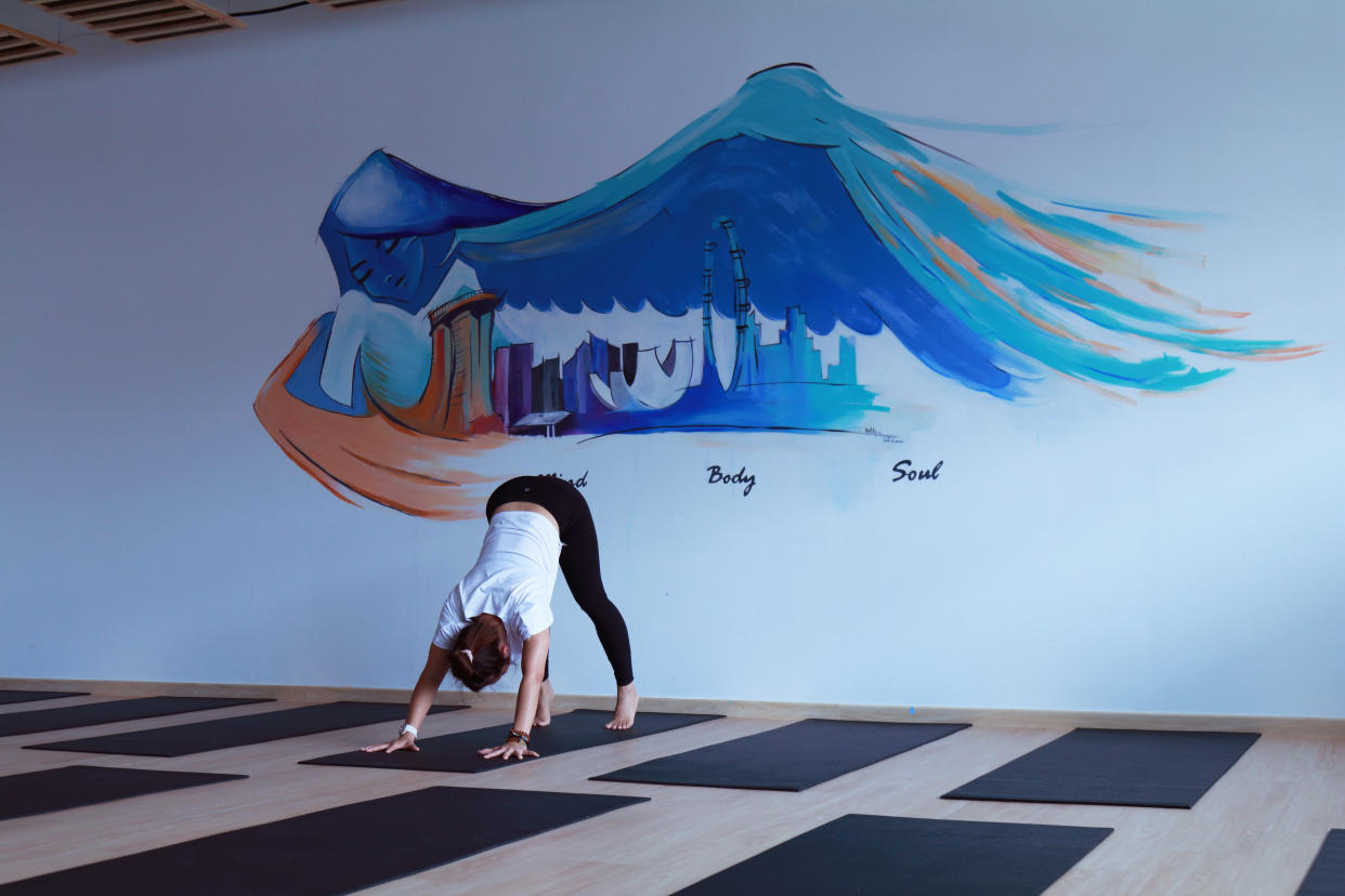 An instructor giving a demonstration at Jal Yoga. (Photo: Nurul Azliah/Yahoo Lifestyle Singapore)