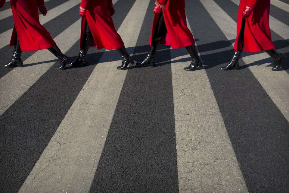 Hospitality staff at crosswalk