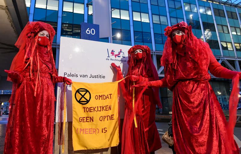 Protest outside court during a hearing in a case against Royal Dutch Shell, in The Hague