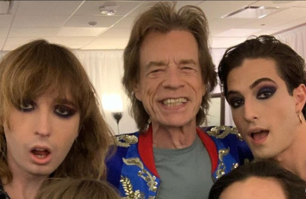 Maneskin pose with Sir Mick Jagger backstage at Vegas gig credit:Bang Showbiz