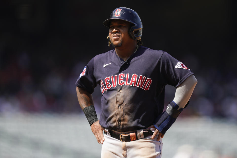 Cleveland Guardians designated hitter Jose Ramirez reacts while walking back to first after a Guardians batter swung a strike during the third inning of a baseball game against the Los Angeles Angels, Sunday, Sept. 10, 2023, in Anaheim, Calif. (AP Photo/Ryan Sun)