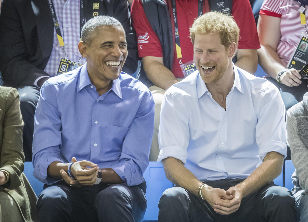 Barack Obama and Prince Harry watch wheelchair basketball at the Pan Am Sports Centre at the 2017 Invictus Games in Toronto, Canada.