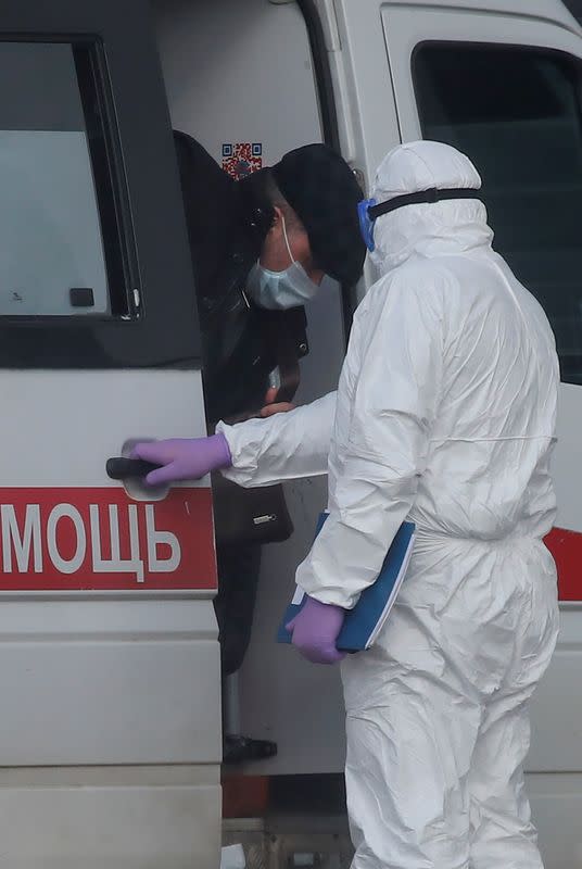 A man arrives at a hospital for patients infected with coronavirus disease in Moscow