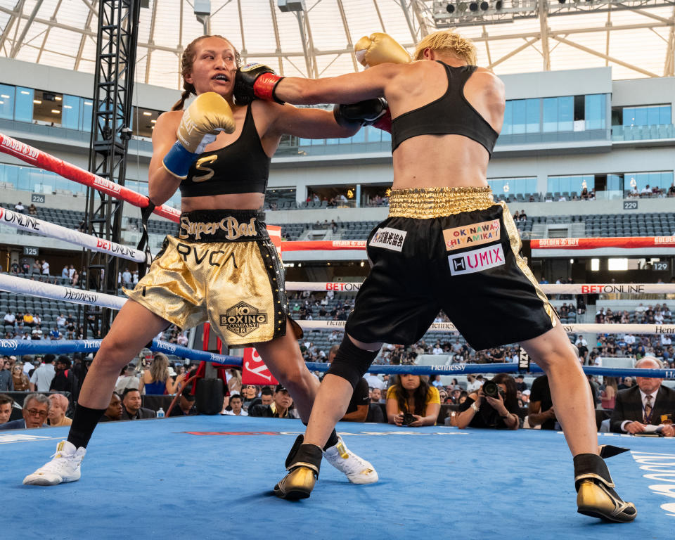 LOS ANGELES, CALIFORNIA - JULY 09: (R-L) Tenkai Tsunami faces off with Seniesa “Super Bad” Estrada fight at Banc of California Stadium on July 9, 2021 in Los Angeles, California. (Photo by Sye Williams/Golden Boy/Getty Images)