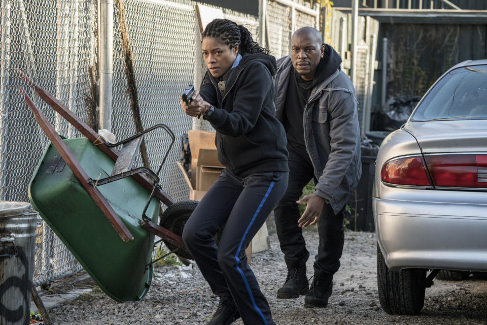 This image released by Sony Pictures shows Naomie Harris, left, and Tyrese Gibson in a scene from "Black and Blue," in theaters on Oct. 25. (Alan Markfield/Sony Pictures via AP)