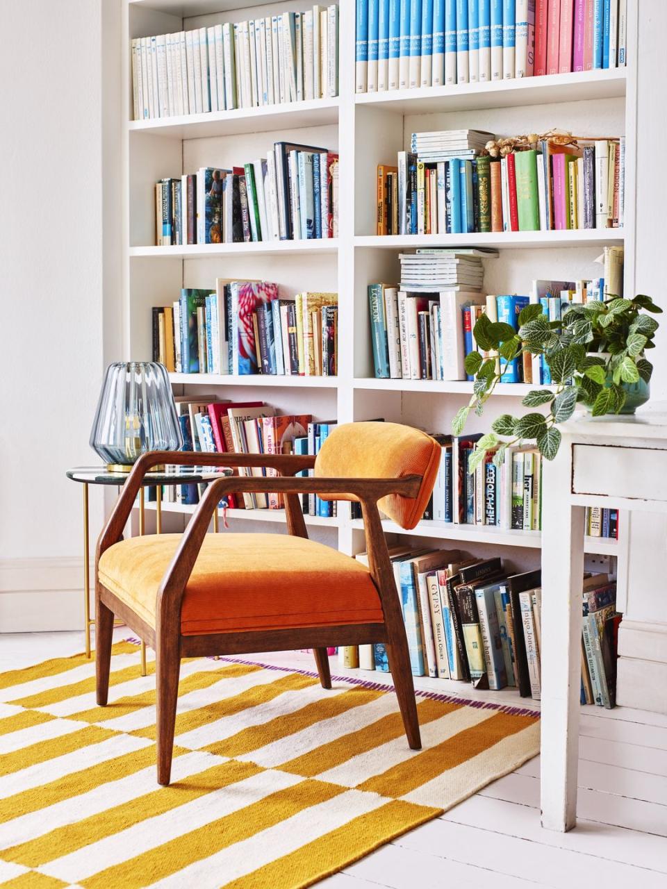 living room or study with bookshelf