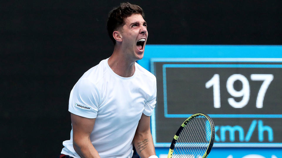 Seen here, Thanasi Kokkinakis cheers wildly in his second round Australian Open clash.