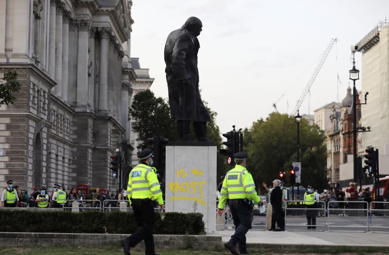 FILE PHOTO: A graffiti is seen on the statue of Winston Churchill, in London