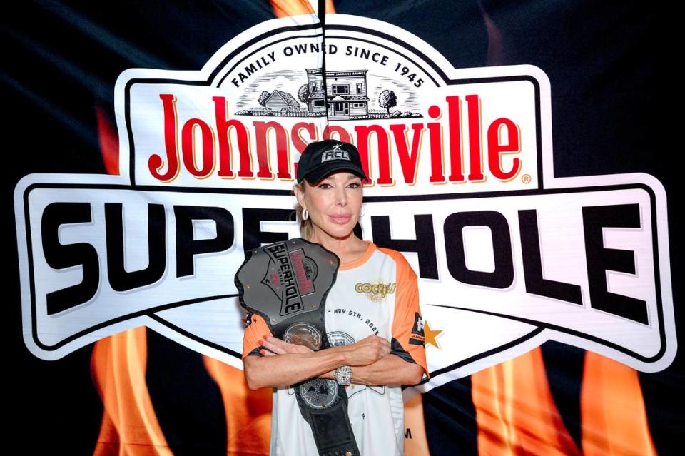 Marysol Patton (“Real Housewives of Miami”) won the Johnsonville SuperHole IV “Best Entrance” title at the Miramar Amphitheater. WWE Superstar Charlotte Flair judged that celeb competition.