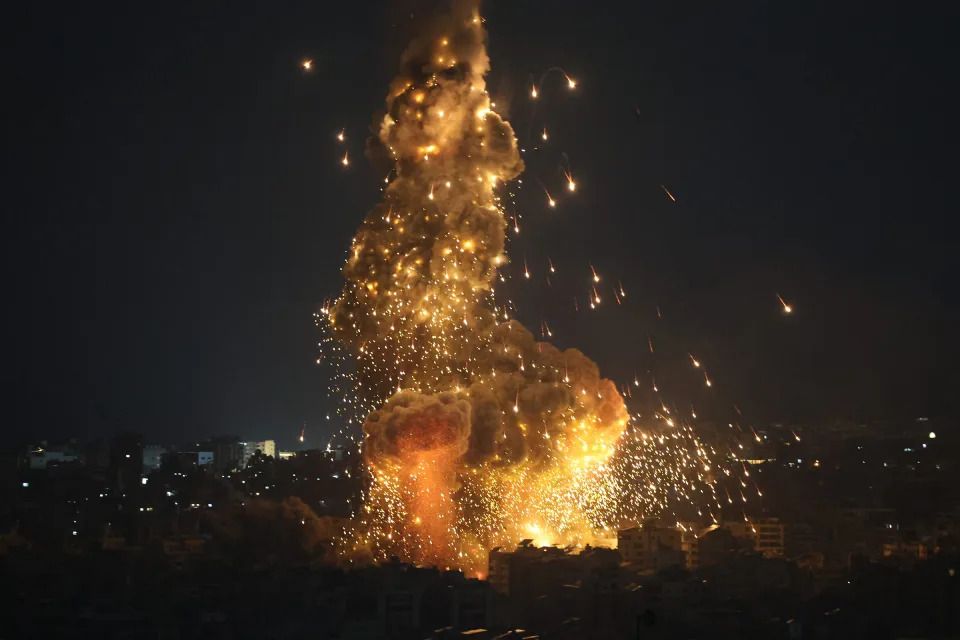 Israeli forces shell buildings in Beirut, on Oct. 6, 2024.<span class="copyright">Ugur Yildirim—dia images/Getty Images</span>