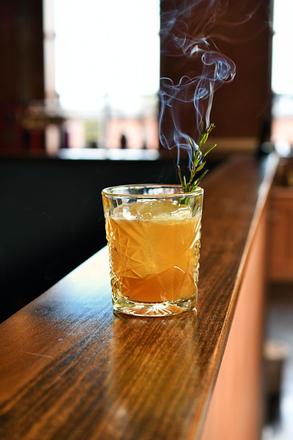 Charred rosemary adds serious aromatics to Barred Owl's Sweater Weather drink.