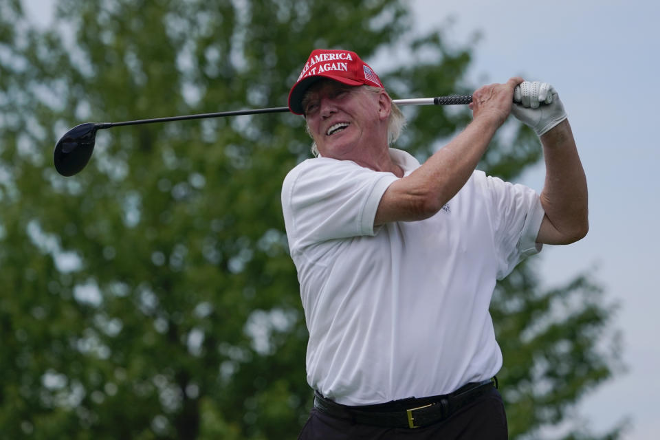 Former President Donald Trump plays during the pro-am round of the Bedminster Invitational LIV Golf tournament in Bedminster, NJ., Thursday, July 28, 2022. (AP Photo/Seth Wenig)