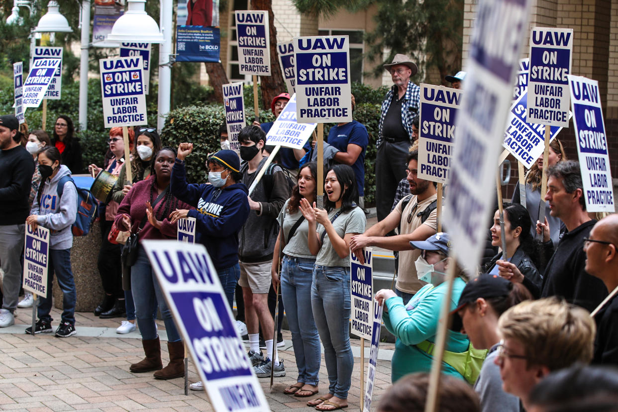 University of California picketers protest at University of California-Irvine on Dec. 6, 2022 in Irvine, Calif. (Allen J. Schaben / Los Angeles Times via Getty Imagages )