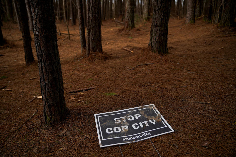 An abandoned protest sign is seen inside Weelaunee People's Park, the planned site of a controversial 